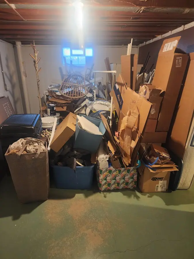 Roll-off dumpster container at job site for 20 Yard Dumpster Rental in Highland Park